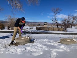 Private wells are particularly vulnerable to contamination from wildfires. Whelton and his students spent a week in January conducting free water testing for these wells in the Louisville, Colorado area. Pictured is Kristofer Isaacson, a Purdue graduate student in Environmental and Ecological Engineering.