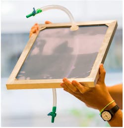 The prototype of the water purificator held by the Master project student Jerome Gabathuler. The prototype of the water purificator held by the Master project student Jerome Gabathuler.