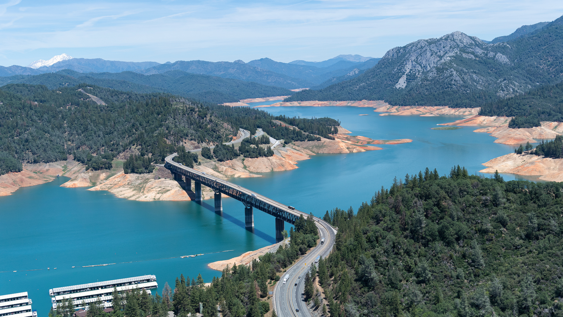 The Pit River Bridge spans Lake Shasta in this aerial view of low water conditions when on this date, the storage was 1,820,933 AF (Acre Feet) which is 40 percent of Total Capacity. Photo taken May 24, 2022.
