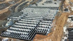 The largest of five retention beds was constructed from 24,500 ft (4.64 miles) of 60-inch diameter corrugated HDPE pipe. Photo shows the bed 50 percent completed. The largest of five retention beds was constructed from 24,500 ft (4.64 miles) of 60-inch diameter corrugated HDPE pipe. Photo shows the bed 50 percent completed.