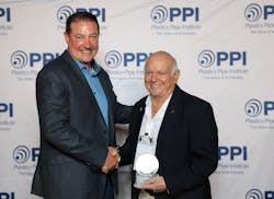 Gene Palermo, Ph.D.(right) was presented with the PPI Lifetime Achievement Award for his nearly five decades of contributions to the plastics pipe industry. PPI President David M. Fink presented the award to Dr. Palermo during the association’s annual meeting in May. Gene Palermo, Ph.D.(right) was presented with the PPI Lifetime Achievement Award for his nearly five decades of contributions to the plastics pipe industry. PPI President David M. Fink presented the award to Dr. Palermo during the association’s annual meeting in May.
