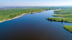 A drone aerial view of Bethany Dams and Reservoir, located on the California Aqueduct and downstream from the Harvey O. Banks Pumping Plant. A drone aerial view of Bethany Dams and Reservoir, located on the California Aqueduct and downstream from the Harvey O. Banks Pumping Plant.