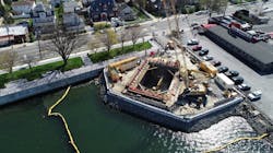 A cofferdam was used during construction to prevent water from entering the work zone on City Island, while the yellow turbidity barrier prevents unwanted discharge from the work area into Eastchester Bay. A cofferdam was used during construction to prevent water from entering the work zone on City Island, while the yellow turbidity barrier prevents unwanted discharge from the work area into Eastchester Bay.