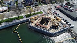 A cofferdam was used during construction to prevent water from entering the work zone on City Island, while the yellow turbidity barrier prevents unwanted discharge from the work area into Eastchester Bay.