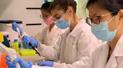 SMART researchers validating assays for quantifying the SARS-CoV-2 Omicron variant from wastewater samples (L-R: Gu Xiaoqiong, Federica Armas and Lee Wei Lin).