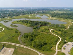 The Buffalo Creek Reservoir Expansion Project increased storage capacity to alleviate flooding for downstream communities, while at the same time improving public recreation amenities at Buffalo Creek Forest Preserve. The MWRD increased the existing reservoir volume by approximately 180 acre-feet to account for an additional 58.6 million gallons of flood storage. The Buffalo Creek Reservoir Expansion Project increased storage capacity to alleviate flooding for downstream communities, while at the same time improving public recreation amenities at Buffalo Creek Forest Preserve. The MWRD increased the existing reservoir volume by approximately 180 acre-feet to account for an additional 58.6 million gallons of flood storage.