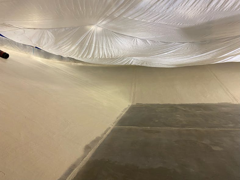 The area&rsquo;s second reservoir was tented with plastic prior to applying the coating, to minimize exposure to the elements, provide more stable temperature and relative humidity levels, and to protect the roof from overspray.