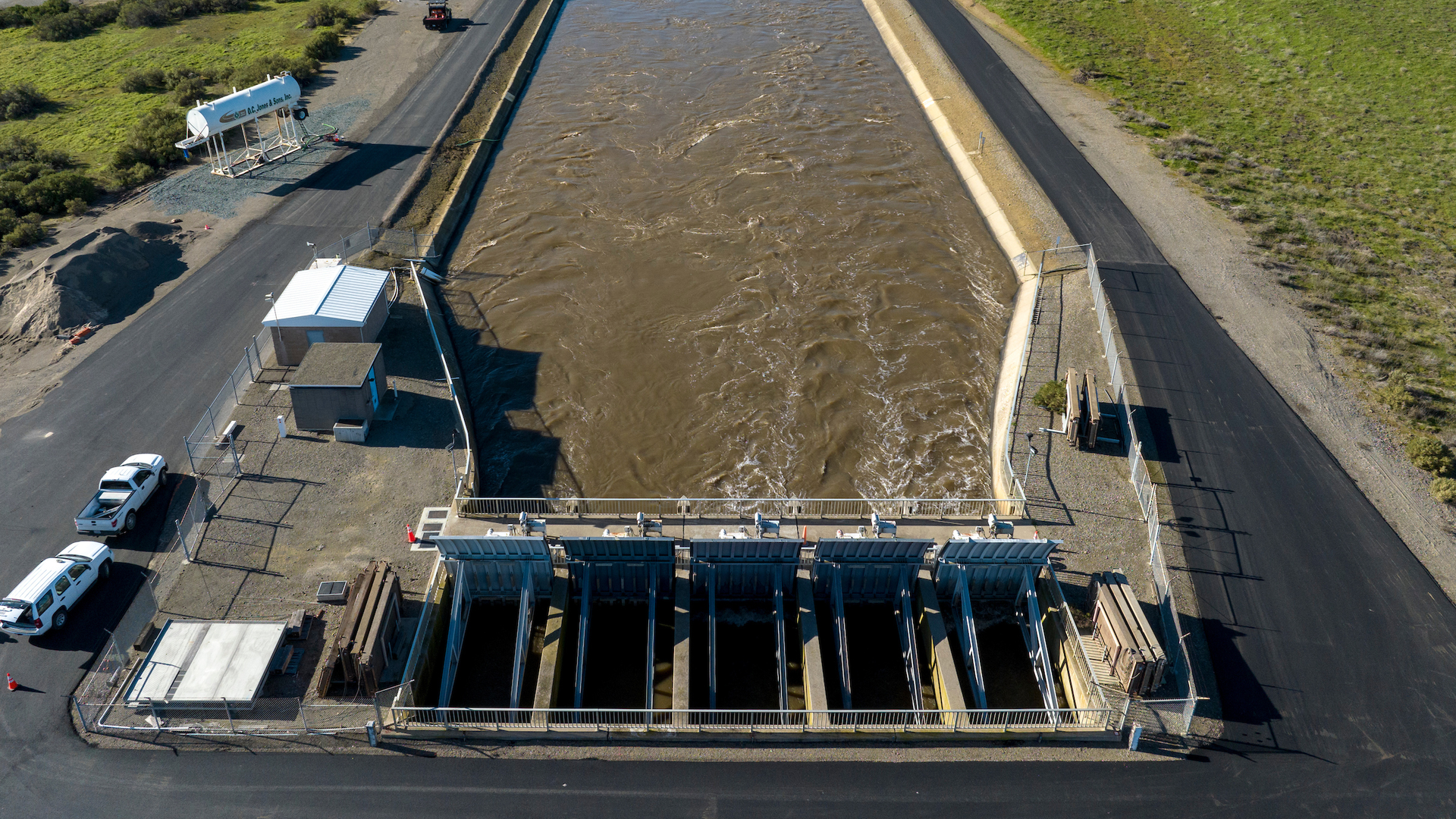 A drone provides a view of water pumped from the Harvey O. Banks Delta Pumping Plant into the California Aqueduct at 9,790 cubic feet per second after January storms. Photo taken Jan. 20, 2023.