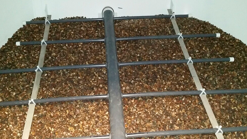 Fig. 3: Horizontal pressure filter shown with new graded gravels and air scour grid, prior to placement of filter media.