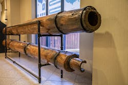 On February 15, 1823, Hunter Peel was given a contract and exclusive rights to convey water through cedar logs — hollowed out and joined with iron bands — to the town square with access for the bucket brigade. The pipes were believed to be hollowed out with a hot iron rod used to chisel out the center up until 1827, and after 1827 an auger was used. On February 15, 1823, Hunter Peel was given a contract and exclusive rights to convey water through cedar logs — hollowed out and joined with iron bands — to the town square with access for the bucket brigade. The pipes were believed to be hollowed out with a hot iron rod used to chisel out the center up until 1827, and after 1827 an auger was used.