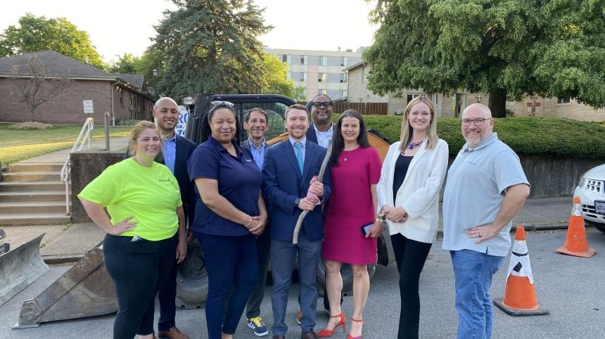 PWSA CEO Will Pickering (center) and other PWSA staff joined mayors from across Pennsylvania, including Pittsburgh Mayor Ed Gainey (back, right of center) at a Neighborhood Lead Service Line Replacement location in the Northside.