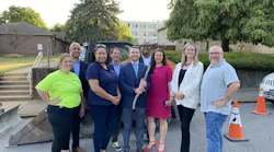 PWSA CEO Will Pickering (center) and other PWSA staff joined mayors from across Pennsylvania, including Pittsburgh Mayor Ed Gainey (back, right of center) at a Neighborhood Lead Service Line Replacement location in the Northside.
