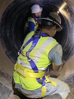 Benjamin McCray and Jarred Rivera evaluate a repaired section of North 60. Benjamin McCray and Jarred Rivera evaluate a repaired section of North 60.