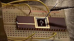 Experimental setup of the device detecting lead ions in a drop of water. Experimental setup of the device detecting lead ions in a drop of water.