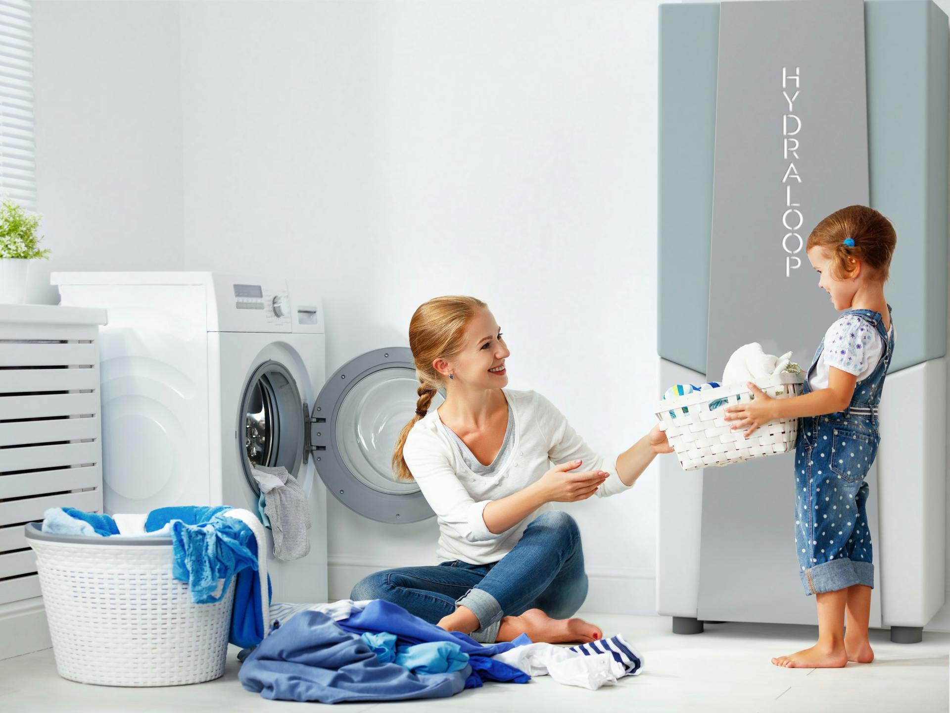 65e72a831f04ab001e1d8c53 Hydraloop H300 In Dew Next To Mother And Child