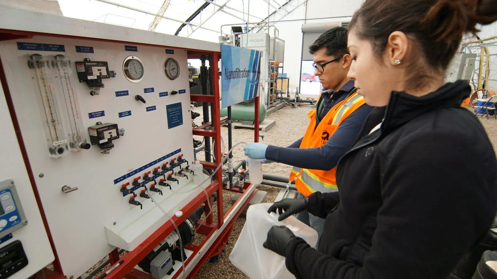 Scientists sample water at El Paso Water (TX) Advanced Water Purification Pilot Facility. The next phase of this project is on track to become the first large direct potable reuse facility in the United States.