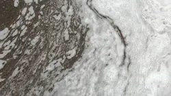 PFOS Chemical Fire Fighting Foam Floating Down the Street.