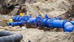 Workers laid water system pipeline at construction site Workers laid water system pipeline at construction site