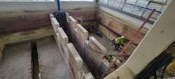 Figure 2: Crews stripped coatings to bare concrete using saw-cutting, chipping and blasting, followed by pressure washing to prepare the basins for resurfacing. Figure 2: Crews stripped coatings to bare concrete using saw-cutting, chipping and blasting, followed by pressure washing to prepare the basins for resurfacing.
