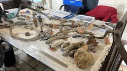 A display of a variety of pipe materials including lead lines. A display of a variety of pipe materials including lead lines.