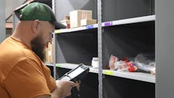 An LB Water employee picks an item using a handheld RF computer. LB Water’s decision to leverage a WMS allowed them to track inventory in real time, saving both time and money. An LB Water employee picks an item using a handheld RF computer. LB Water’s decision to leverage a WMS allowed them to track inventory in real time, saving both time and money.