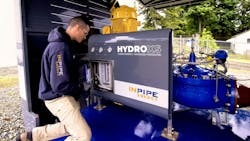 An InPipe Energy technician services the HydroXS unit, which captures wasted energy while managing water pressure. An InPipe Energy technician services the HydroXS unit, which captures wasted energy while managing water pressure.