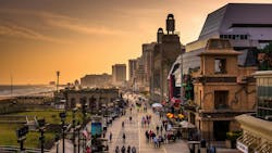 View of the boardwalk at sunset, in Atlantic City, New Jersey View of the boardwalk at sunset, in Atlantic City, New Jersey