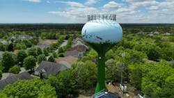 Figure 3: Mural artist Peter Goetzinger and his son Orion first drew freehand outlines of birds, insects and plant life, creating a larger-than-life, paint-by-numbers canvas (Photo credit: Courtesy of Paul Britt, New Jersey Water Association). Figure 3: Mural artist Peter Goetzinger and his son Orion first drew freehand outlines of birds, insects and plant life, creating a larger-than-life, paint-by-numbers canvas (Photo credit: Courtesy of Paul Britt, New Jersey Water Association).