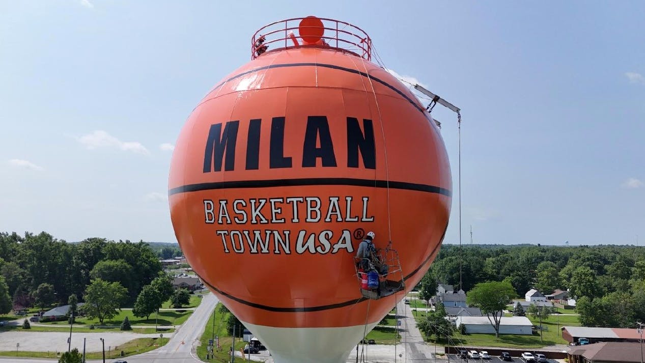 Figure 4: Crews apply the final branding details to Milan, Indiana&rsquo;s new water tower, using tinted Fluorokem HS 100 for crisp, high-gloss lettering. Photo courtesy of Fleis & VandenBrink (Mick Clouse)