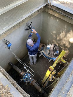 Collin Bryant from Cla-Val installing the XP2F pressure monitoring system (Photo credit: Bryce Watkins). Collin Bryant from Cla-Val installing the XP2F pressure monitoring system (Photo credit: Bryce Watkins).