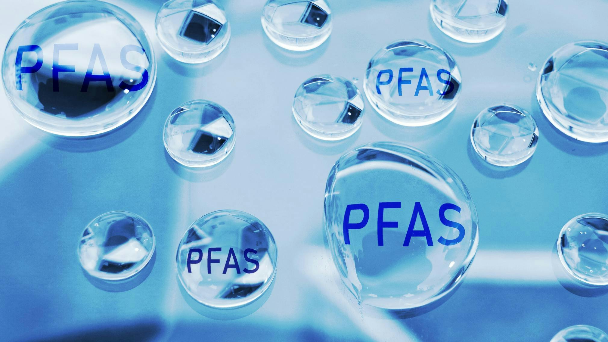 Water drops with PFAS text