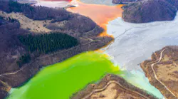 Aerial view of a lake filled with chemical waste water