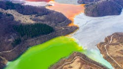 Aerial view of a lake filled with chemical waste water Aerial view of a lake filled with chemical waste water