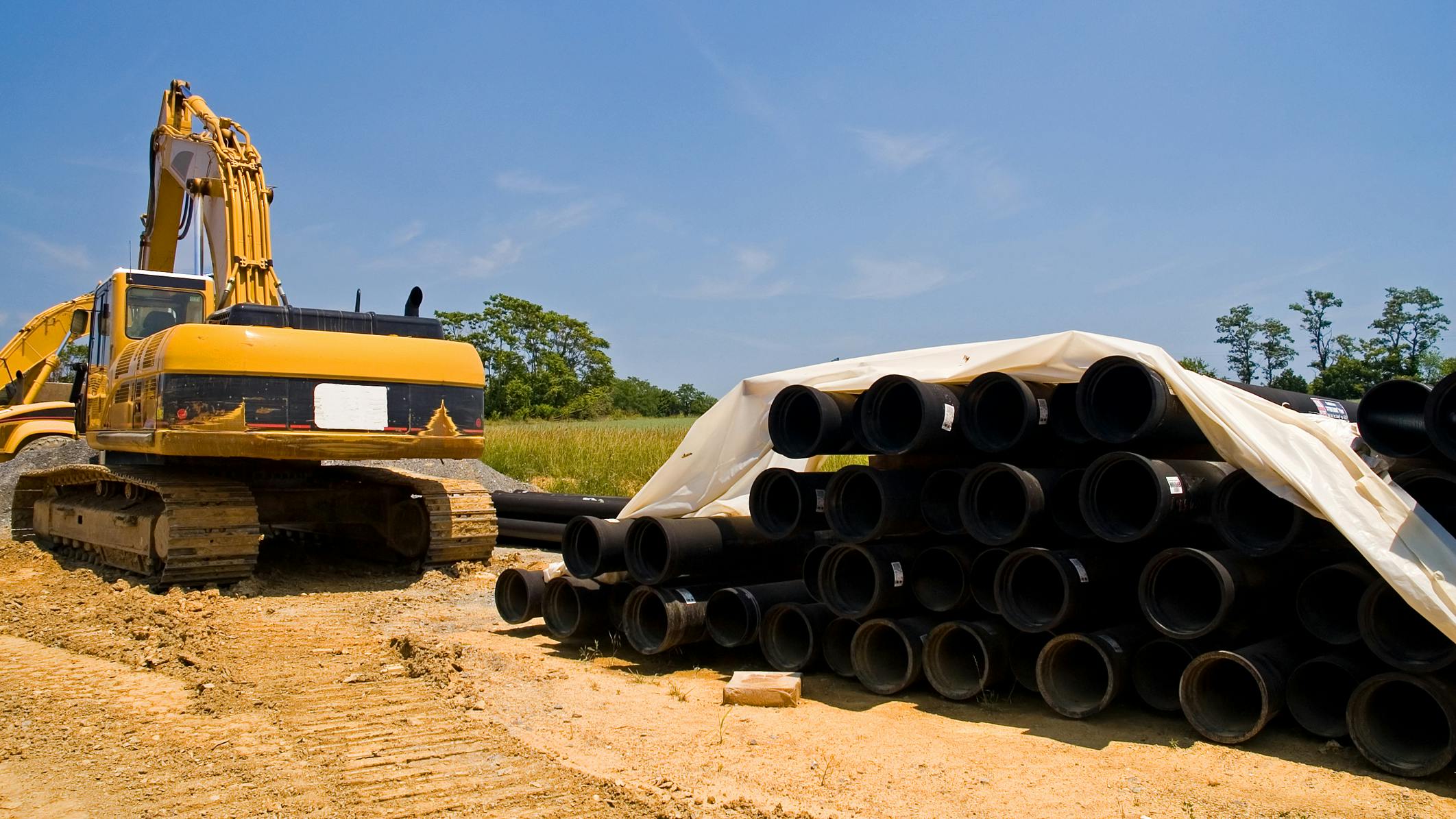 Excavator and water pipes