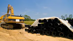 Excavator and water pipes Excavator and water pipes