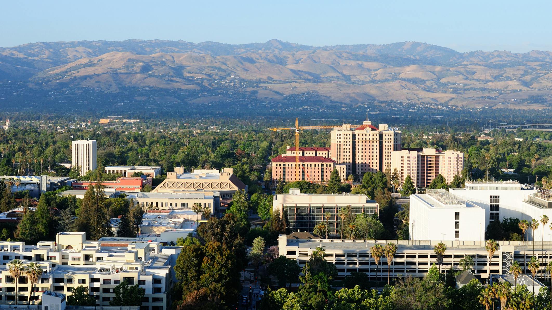 Diablo mountains and an aerial view of buildings around San Jose California