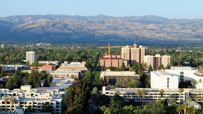 Diablo mountains and an aerial view of buildings around San Jose California