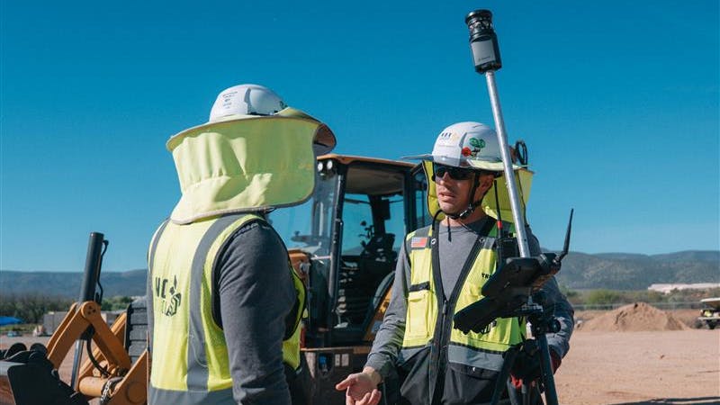 A survey crew reviews real-time site data before the next move is made (Photo credit: Nox Group).