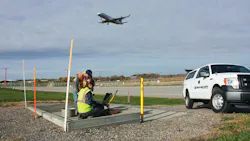 Water sampling for contaminants near an airport.